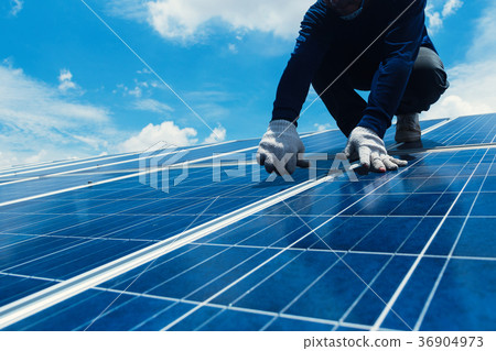 engineer team working on replacement solar panel 36904973