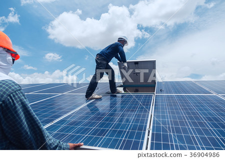 engineer team working on replacement solar panel 36904986