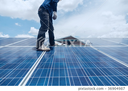 engineer team working on replacement solar panel 36904987