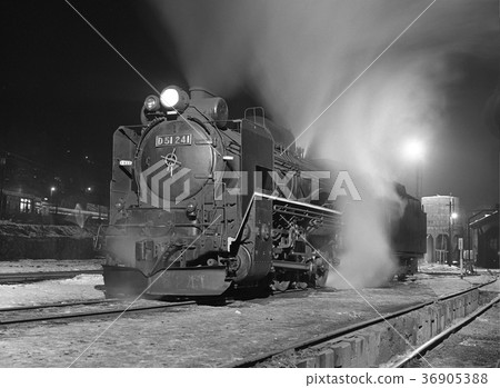 Steam locomotive at night Steam locomotive at night 36905388
