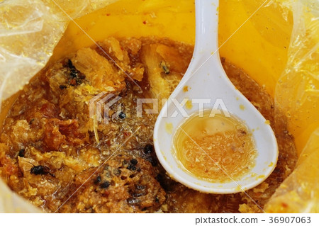 golden honeycomb in the honey in market. golden honeycomb in the honey in market. 36907063