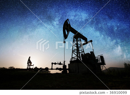 Oil pump on the oil field in the night Oil pump on the oil field in the night 36910099