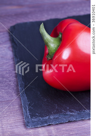 Red pepper on a stone tray Red pepper on a stone tray 36910401