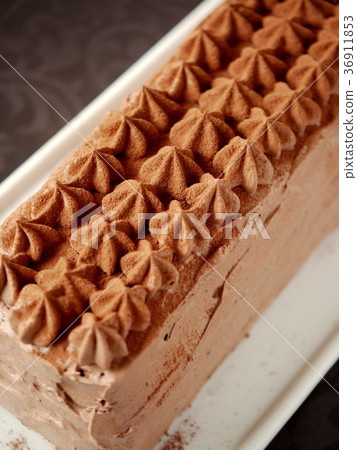 Chocolate sponge cake hall black background (high angle) 36911853