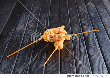 Deep-fried shrimp on skewer 36914204