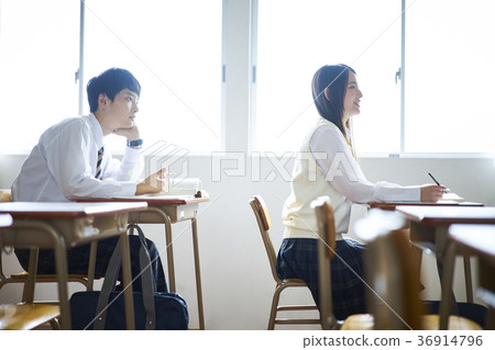 Students studying in a classroom 36914796