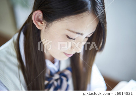 Students studying in a classroom 36914821