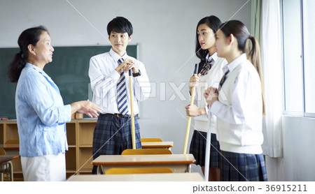 Students cleaning the classroom Students cleaning the classroom 36915211