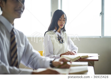 Students studying in a classroom Students studying in a classroom 36915428