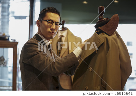 Men in men's clothing store Men in men's clothing store 36915641