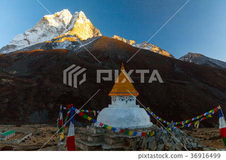Buddhist stupa on mountain trekking path in 36916499