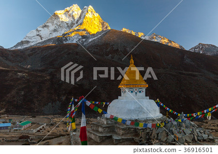 Buddhist stupa on mountain trekking path in 36916501