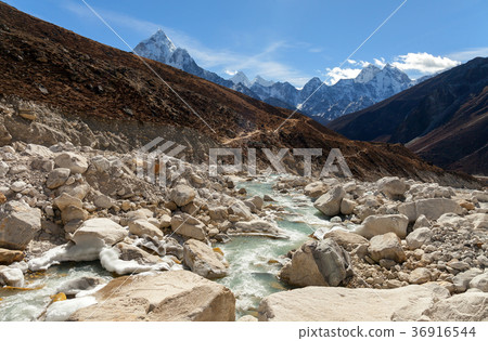 The peak of Mount Ama Dablam seen from Dingboche The peak of Mount Ama Dablam seen from Dingboche 36916544