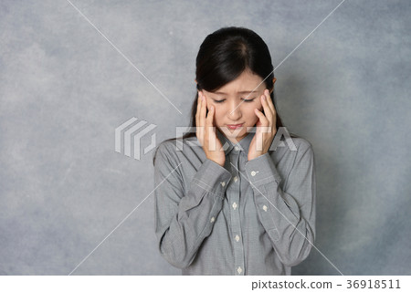 A woman with a depressed face A woman with a depressed face 36918511