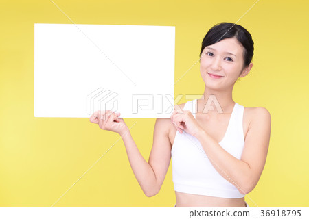 A woman with a white board A woman with a white board 36918795