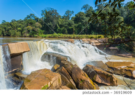 Beautiful waterfall in green forest in jungle Beautiful waterfall in green forest in jungle 36919609