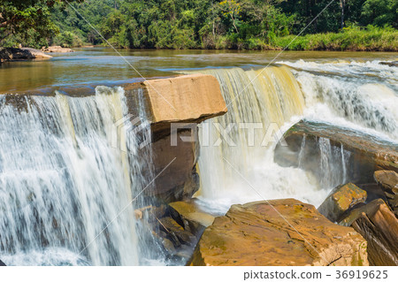 Beautiful waterfall in green forest in jungle Beautiful waterfall in green forest in jungle 36919625