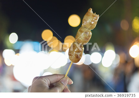 Thai style grilled pork sausage with bamboo sticks Thai style grilled pork sausage with bamboo sticks 36919735