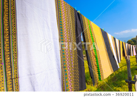 Colorful Thai sarongs fluttering in the wind Colorful Thai sarongs fluttering in the wind 36920011