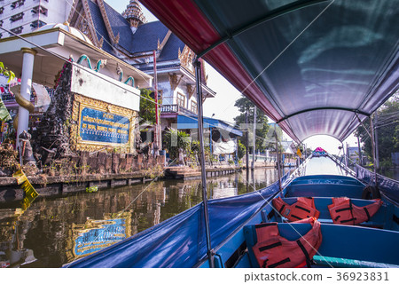 Take a leisurely boat trip through the river that flows through the Chao Phraya River tributary southwest Take a leisurely boat trip through the river that flows through the Chao Phraya River tributary southwest 36923831