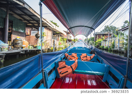 Boat tour of leisurely waterside by boat Boat tour of leisurely waterside by boat 36923835