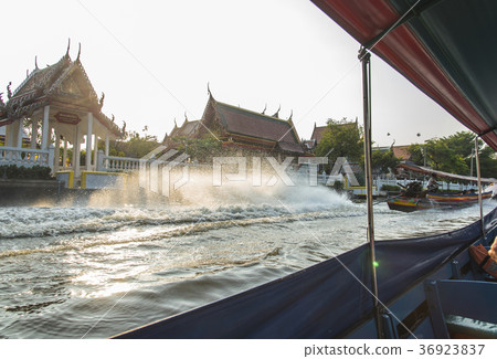 Boat tour of leisurely waterside by boat Boat tour of leisurely waterside by boat 36923837