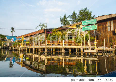 Boat tour of leisurely waterside by boat Boat tour of leisurely waterside by boat 36923839