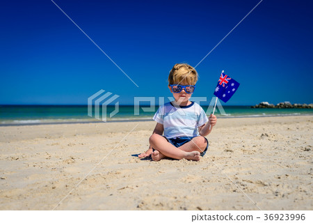 Cute child with Australian flag on Australia day Cute child with Australian flag on Australia day 36923996