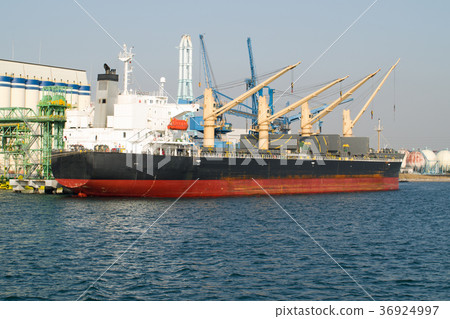 Ship handling cargo at the grain pier Ship handling cargo at the grain pier 36924997