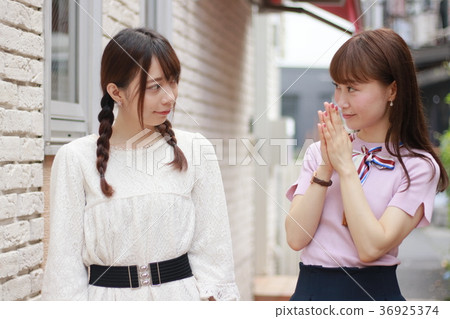 Two young women in the city 36925374