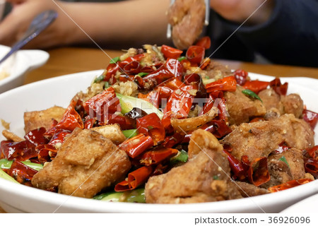 Motion of people eating hot spicy fried chicken Motion of people eating hot spicy fried chicken 36926096