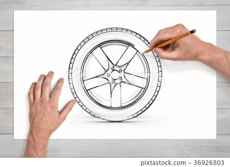 Two male hands in close view as they draw a car Two male hands in close view as they draw a car 36926803