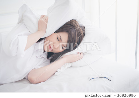 beautiful Asian women sick with sleep on bed beautiful Asian women sick with sleep on bed 36926990