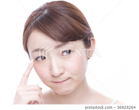 Woman pointing at the buttocks 36928264