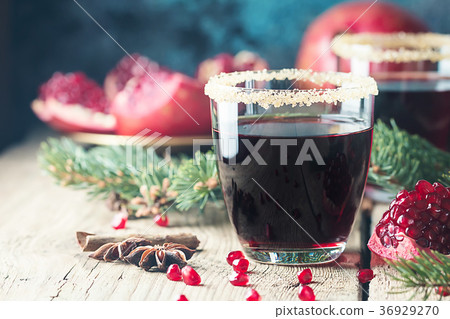 A glass of pomegranate juice A glass of pomegranate juice 36929270