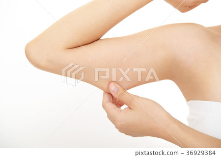 A woman holding his upper arm A woman holding his upper arm 36929384