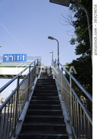 Overpass stairs streetlights building public facilities 36929658