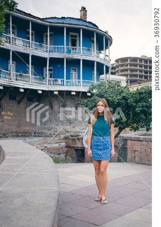 Beautiful young woman on the bridge of peace in Beautiful young woman on the bridge of peace in 36930792