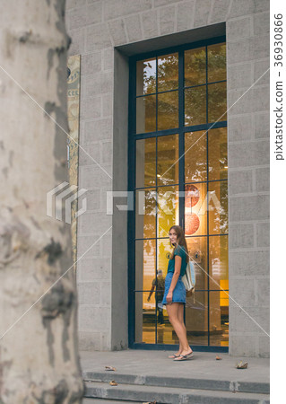 Beautiful young woman on the bridge of peace in Beautiful young woman on the bridge of peace in 36930866