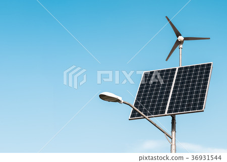 Solar panel, wind turbine under blue sky Solar panel, wind turbine under blue sky 36931544