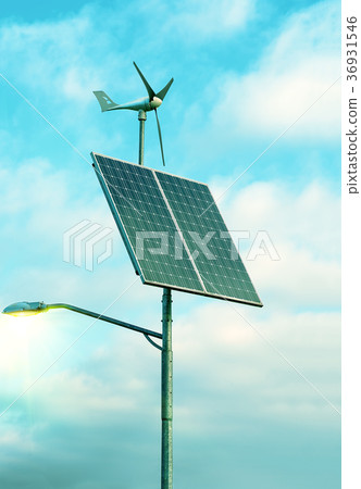 Solar panel, wind turbine under cloudy blue sky Solar panel, wind turbine under cloudy blue sky 36931546