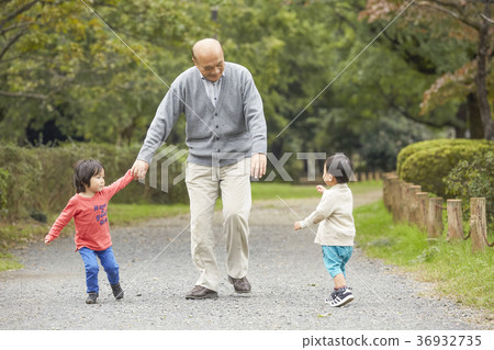 Senior playing with grandson 36932735