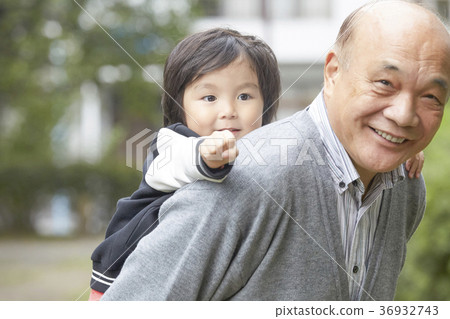 Senior playing with grandson Senior playing with grandson 36932743