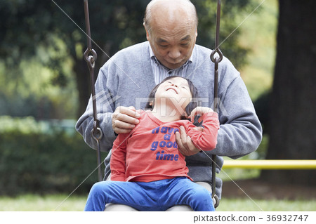 Senior playing with grandson 36932747
