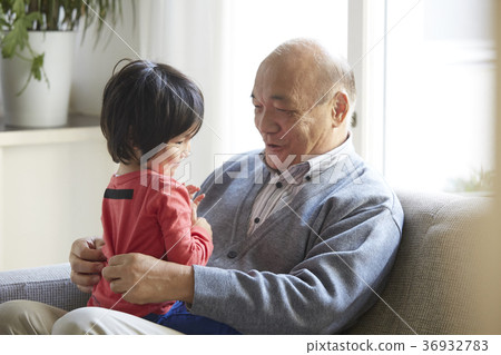 Senior playing with grandson 36932783