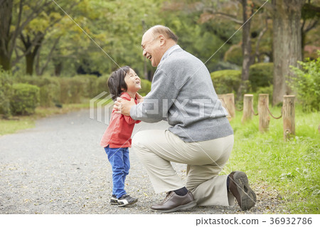 Senior playing with grandson 36932786