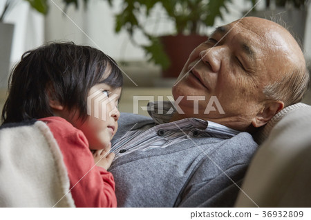 Senior playing with grandson 36932809