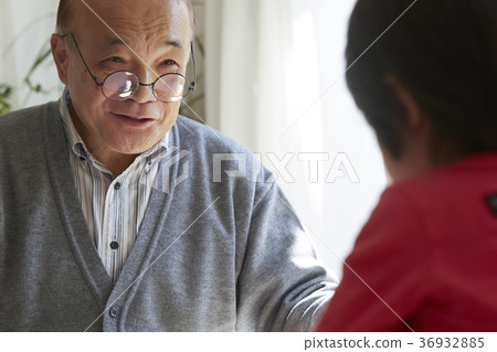 Senior playing with grandson 36932885