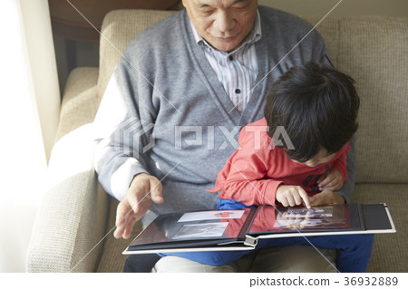 Senior playing with grandson 36932889