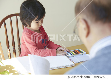 Senior playing with grandson 36932890